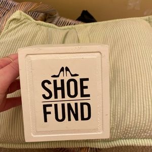 Shoe funds “piggy bank”